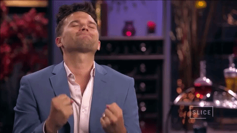 Gif of the actor Tom from TV Show Vanderpump Rules celebrating