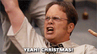 Emoji of Dwight, from The Office TV Show, celebrating Christmas